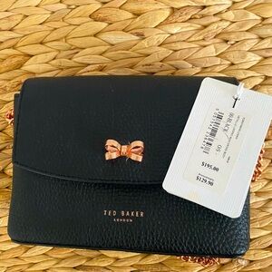 Metallic looped bow cross body new